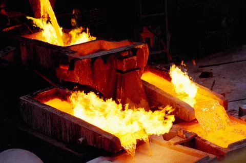 Hot liquid copper pouring in to casts, India Stock Photos