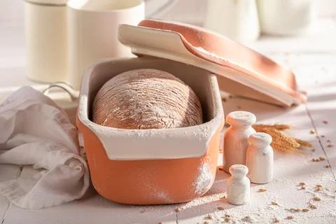 Hot loaf of bread in a home bakery. Stock Photos