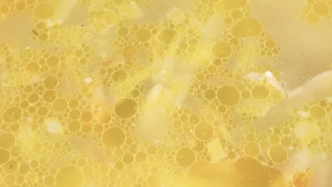 Hot, meat soup from which there is steam, macro shot zoom Stock Footage 106229583