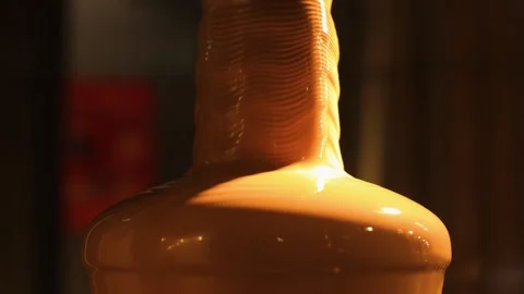 Hot melted chocolate flows down fountain cascade in slow motion.dripping down 스톡 동영상 252384938