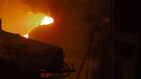 A hot metal background and texture. Metal factory interior, steel works, heavy Stock Footage 113078778