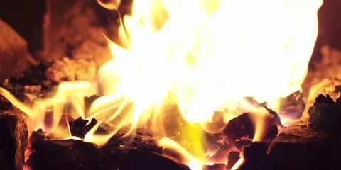Hot metal is put into the fire. 動画素材 104323454