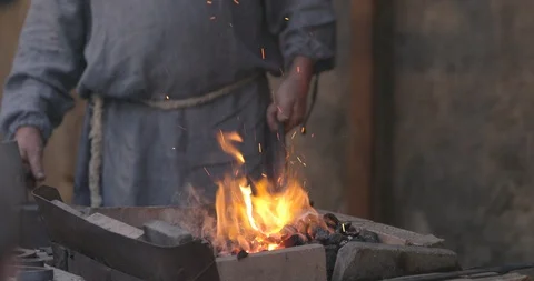 Hot metal work from a blacksmith Stock Footage 115996804