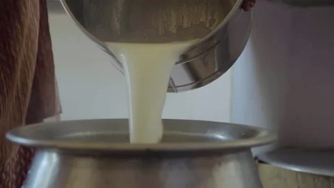 Hot Milk in vessel Stock Footage 148279831