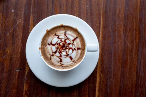 Hot mocha coffee on the table Stock Photos