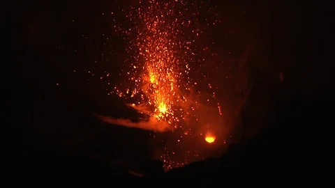 Hot molten lava exploding in the air out of active volcano Vanuatu. LOCKED Stock Footage 112578054