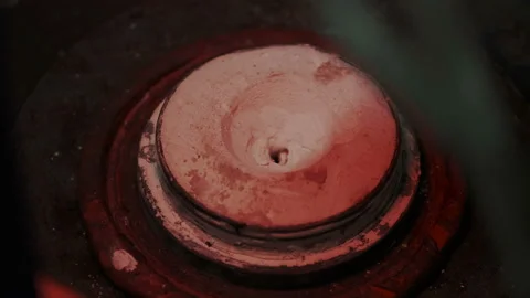 Hot molten lava stream or flowing liquid magma fills shape form for production Stock Footage 109098104