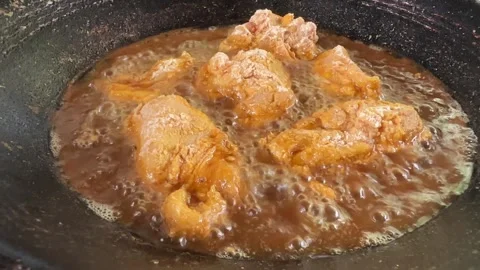 Hot Oil Bubbling While Frying Chicken Close Up Stock Footage 325163304