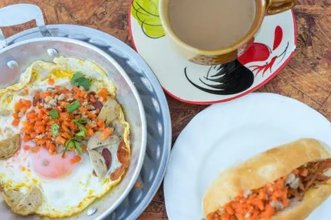 Hot pan fried egg stuff with minced pork and sausage Stock Photos