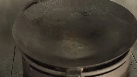 Hot pan ready with steam ready for oil Stock Footage 88570806