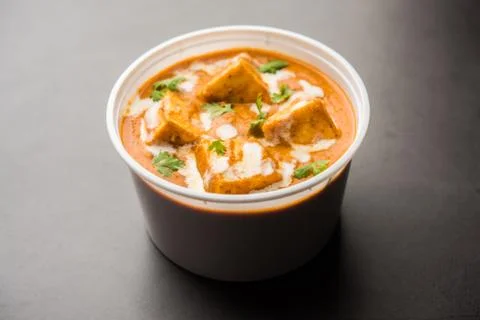 Hot Paneer Butter Masala curry is a popular Indian dish ready for delivery or Stock Photos