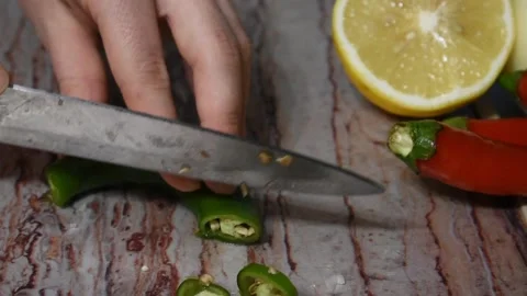 Hot pepper and knife Video stock 144938122