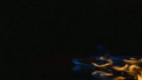 Hot pepper in fire arms. hot pepper in flames on a black background Stock Footage 71084231