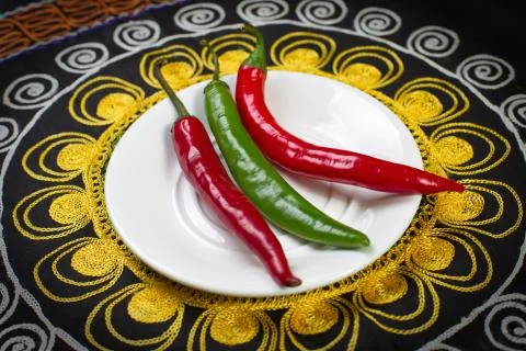 Hot pepper on a plate. Stock Photos
