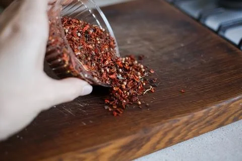 Hot pepper spice stands in the kitchen Stock Photos