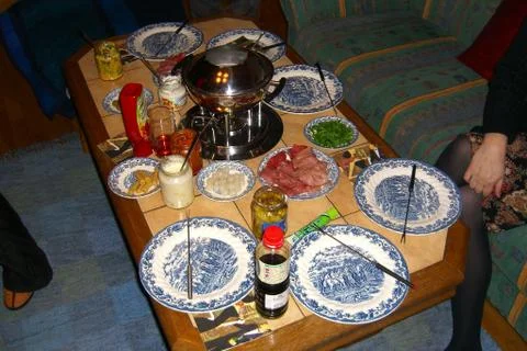 Hot pot dinner table prepared for dinner 写真素材