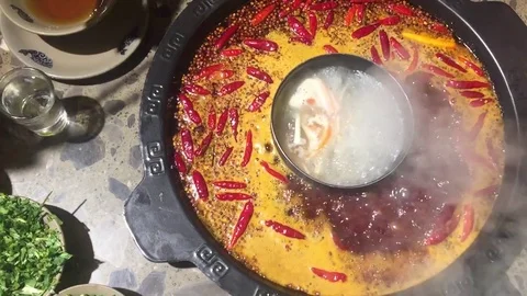 Hot pot on table Stock Footage 79315345