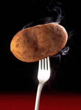 Hot Potato on a Fork Stock Photos