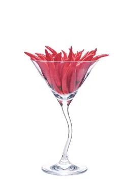 Hot, red chili peppers in a martini glass. Stock Photos