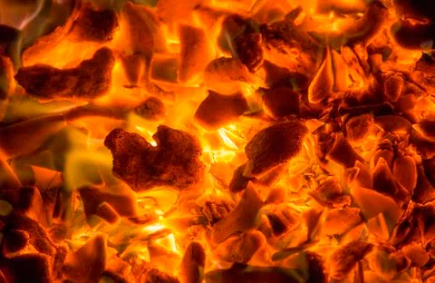 Hot red coals. background texture of fire Stock Photos
