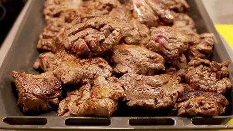 Hot roasted meat on baking tray, steam from the dish Stock Footage 111072173