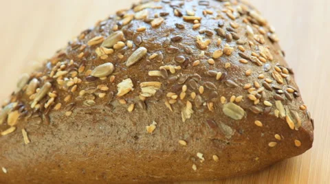 Hot rye bread with sunflower seeds and black sesame Stock Footage 64769167