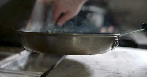 Hot sauce bring prepared by chef Stock Footage 105377632