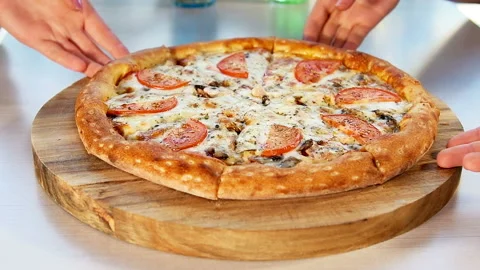 Hot slices of delicious pizza with stringy cheese. Stock Footage 101750204