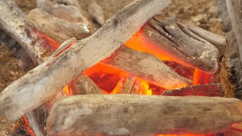 Hot sparking live-coals burning in a barbecue. Stock Footage 108750720