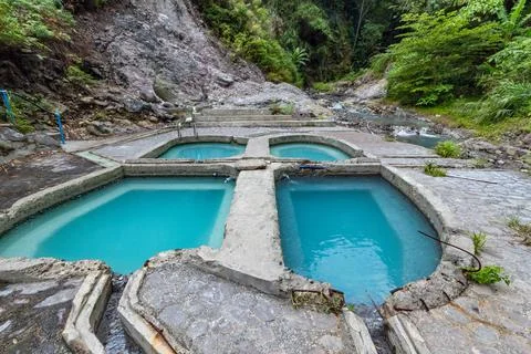 Hot spring baths. Boiling water full of sulfur coming out the mountain. Stock Photos
