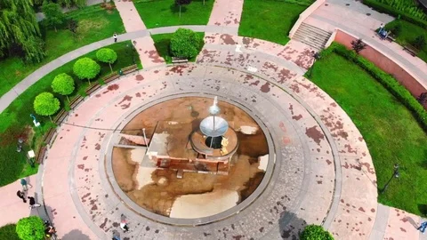 Hot spring geyser in park rotating with people walking around Stock Footage 91824397
