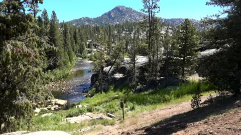 Hot Spring by a River in the Mountains Stock Footage 134499298