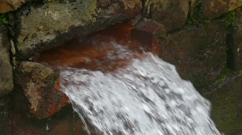Hot Spring Water Flow from Pipe on Wall Stock Footage 46034336