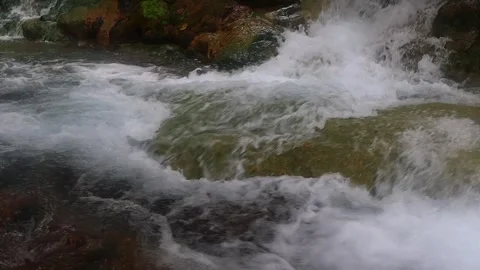 Hot Spring Water Flowing Over Mossy Rocks at Mengeruda, Soa, Flores, Indonesia 스톡 동영상 343707644