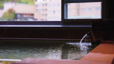 Hot Spring Water Flows into Japanese Style Onsen Ofuro Bath Stock Footage 334731914