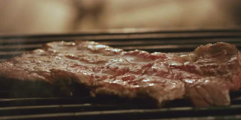 Hot steak on the electric grill Stock Footage 247385104
