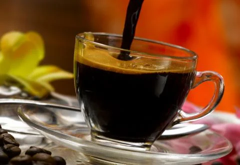 Hot steaming coffee in a cup Stock Photos