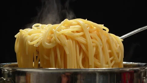 Hot Steaming Cooked Spaghetti Lifted From Pot Video stock 345773728