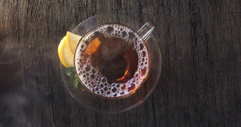 Hot steaming tea straight down view Vidéo 262702651
