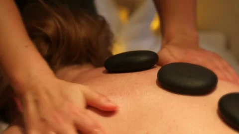Hot stone massage scene Stock Footage 105004144