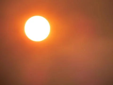 Hot sun causing global warming, heat wave and climate change Stock Photos