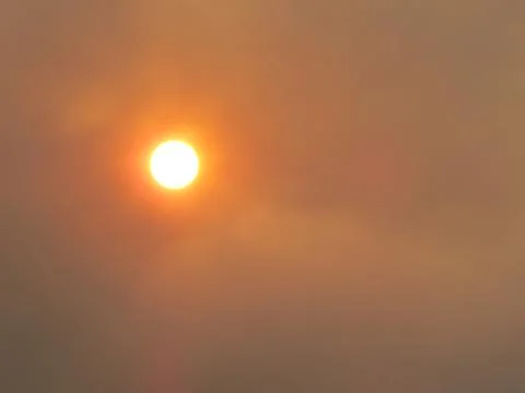 Hot sun causing global warming, heat wave and climate change Stock Photos