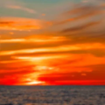 Hot sunset - blurred image 写真素材