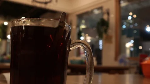 Hot sweet tea served at the dining table Video stock 119798816