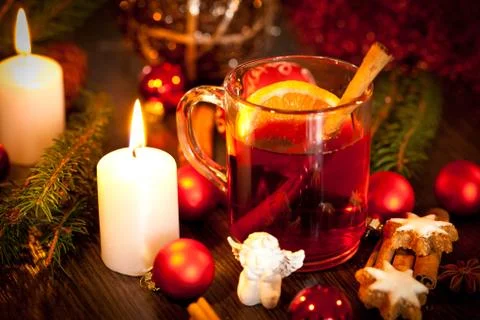 Hot tasty spicy mulled red wine with orange and cinnamon christmas Stock Photos