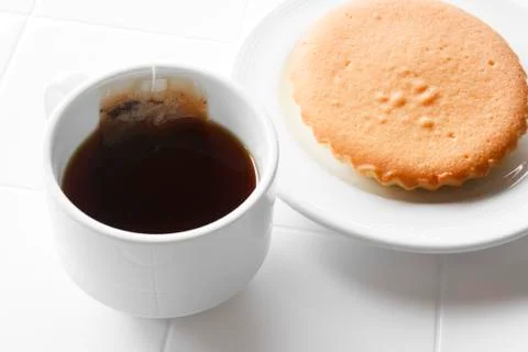 Hot tea with cake Stock Photos