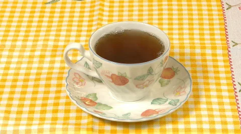 Hot tea cup steam and bubbles 動画素材 656325