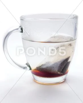 Hot tea in glass cup Stock Photos
