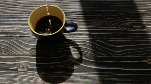 Hot tea with milk on the table Stock Footage 63275949