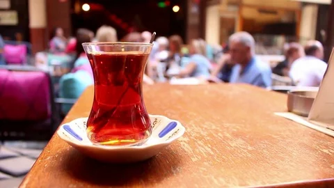 Hot tea on the old and old Turkish coffee table in Istanbul Stock Footage 116120605